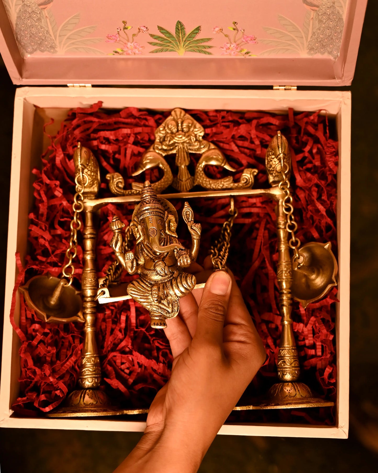 Ganesha Brass Idol on Swing with Hanging Deepak - Prosperity Symbol